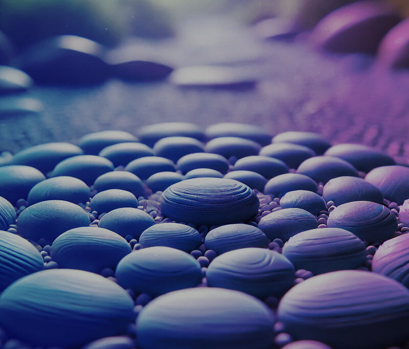Abstract image of smooth purple and blue stones, representing the concept of counselling and well-being.