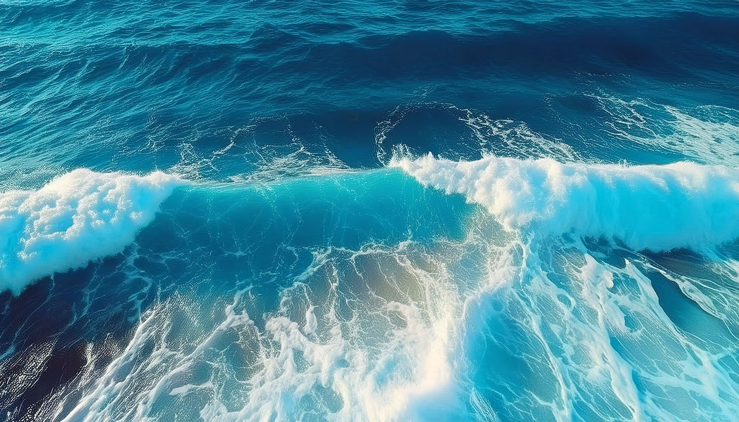 Ocean waves with white foam.