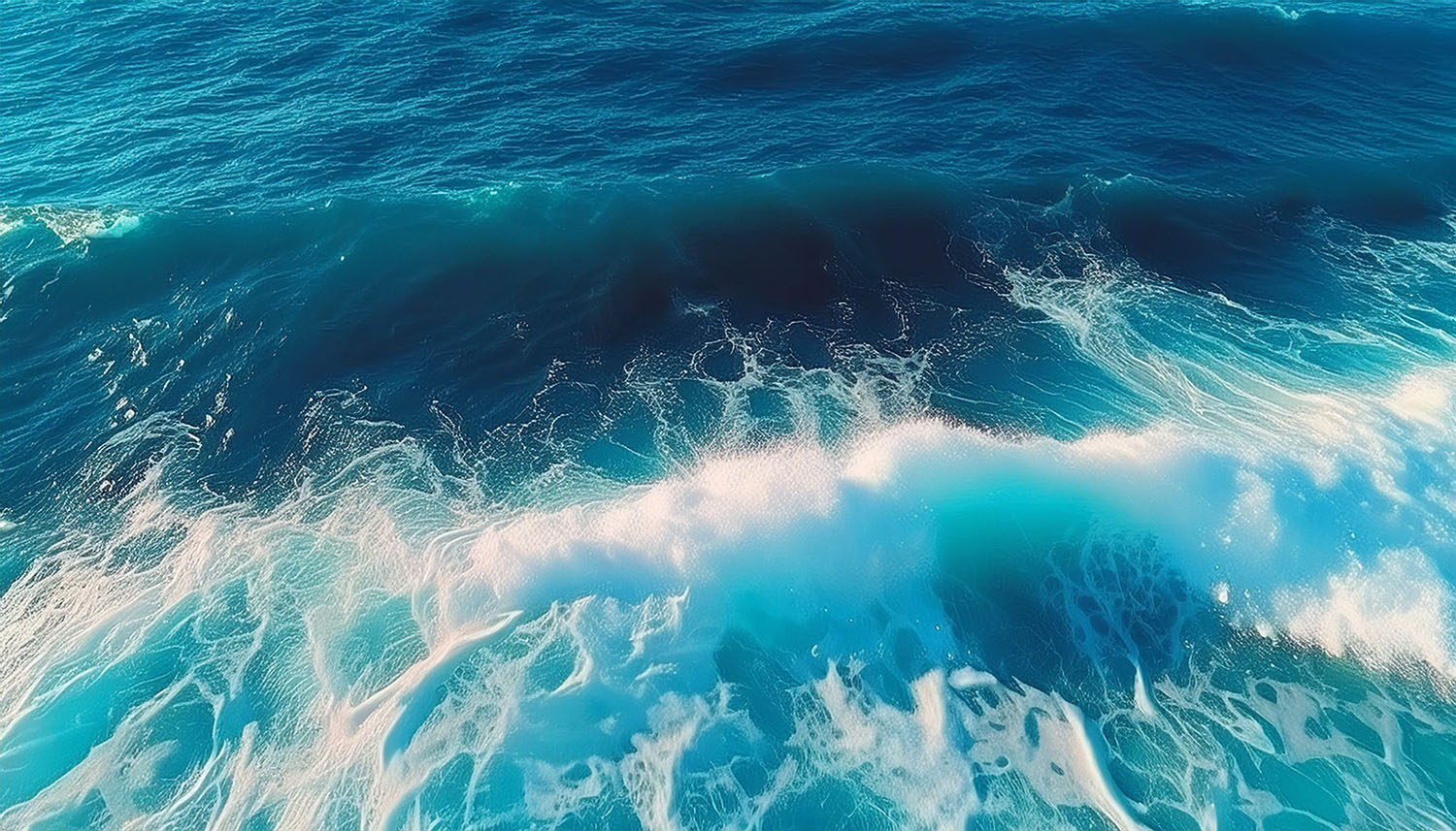Ocean waves with white foam.